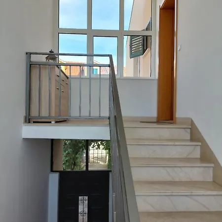 Laura M Apartman